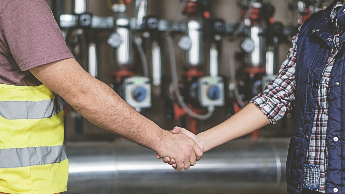 coworkers shaking hands